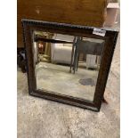 Carved decorative wood framed mirror with double bevelled edge glass