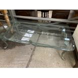 Metal framed coffee table with glass top