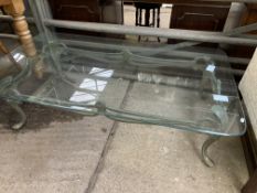 Metal framed coffee table with glass top