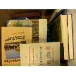 Three boxes containing a large quantity of books about Hungary.
