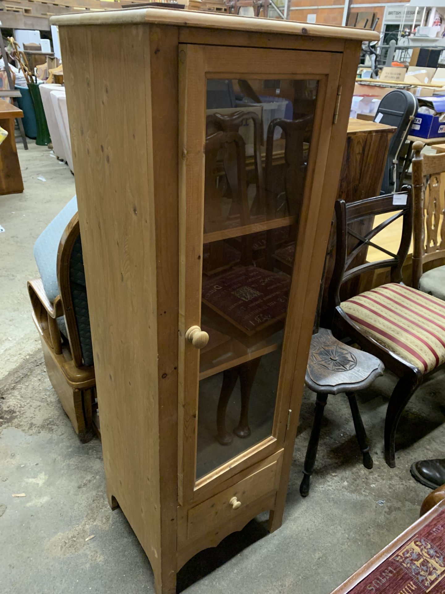 Pine cabinet with glazed door and drawer beneath