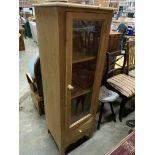 Pine cabinet with glazed door and drawer beneath