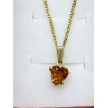 9ct gold citrine pendant on 9ct gold chain.