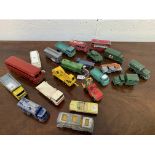 Assortment of various die-cast vehicles including Dinky and Matchbox.