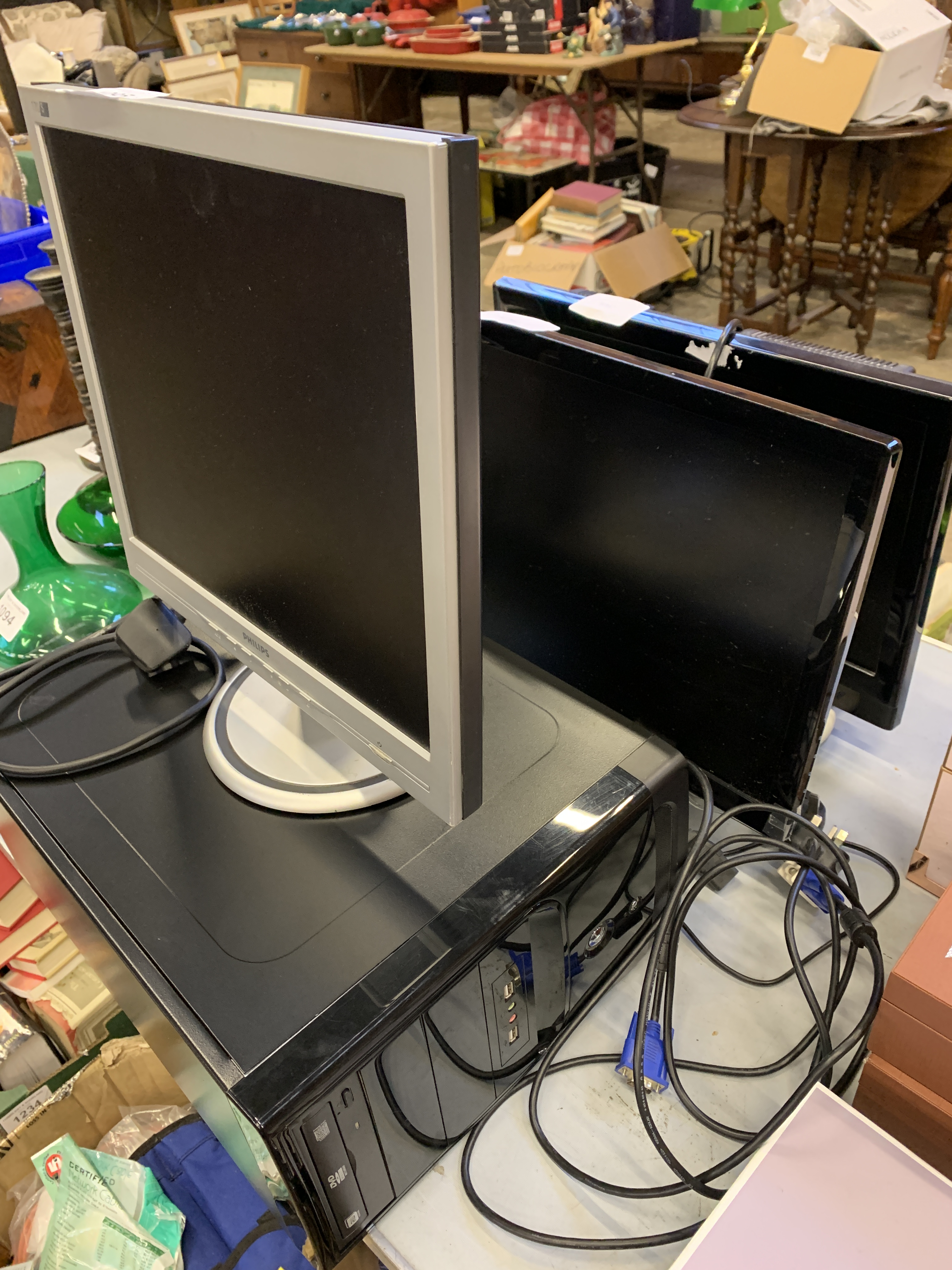 Goodmans TV, 3 monitors and a quantity of network cables