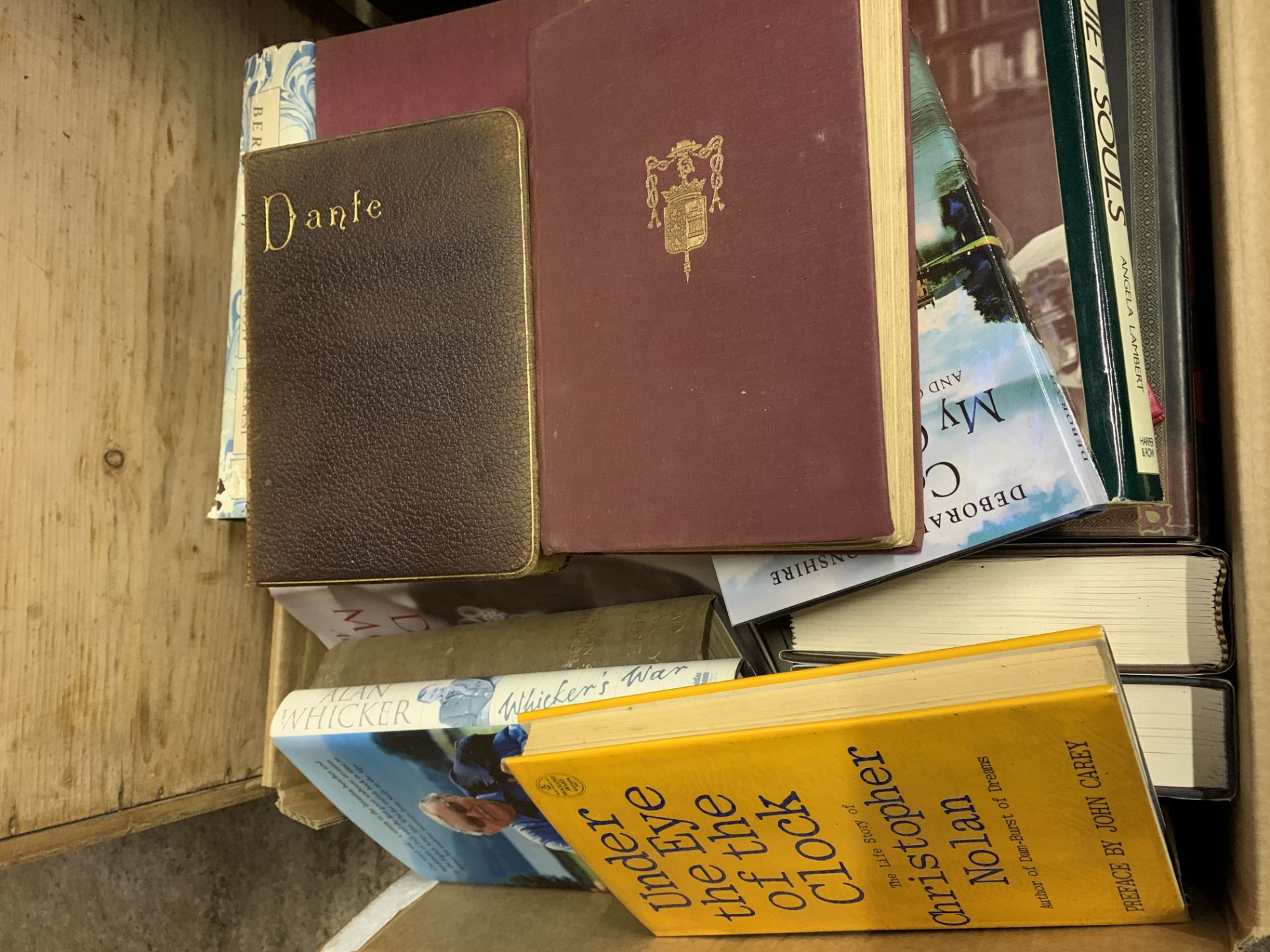 Two boxes containing a large quantity of autobiographies and biographies.