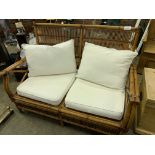 Cane conservatory style sofa.