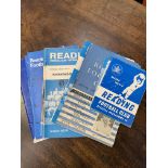 Nineteen Reading Football Club match programmes and a handbook