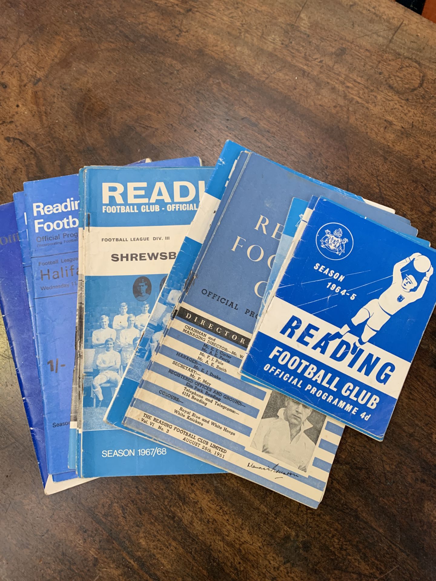 Nineteen Reading Football Club match programmes and a handbook