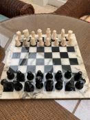 Marble effect chess board and pieces