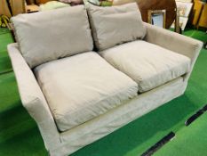 Two seat "Otto" sofa upholstered in mink smart velvet (100% polyester) by Sofa.com