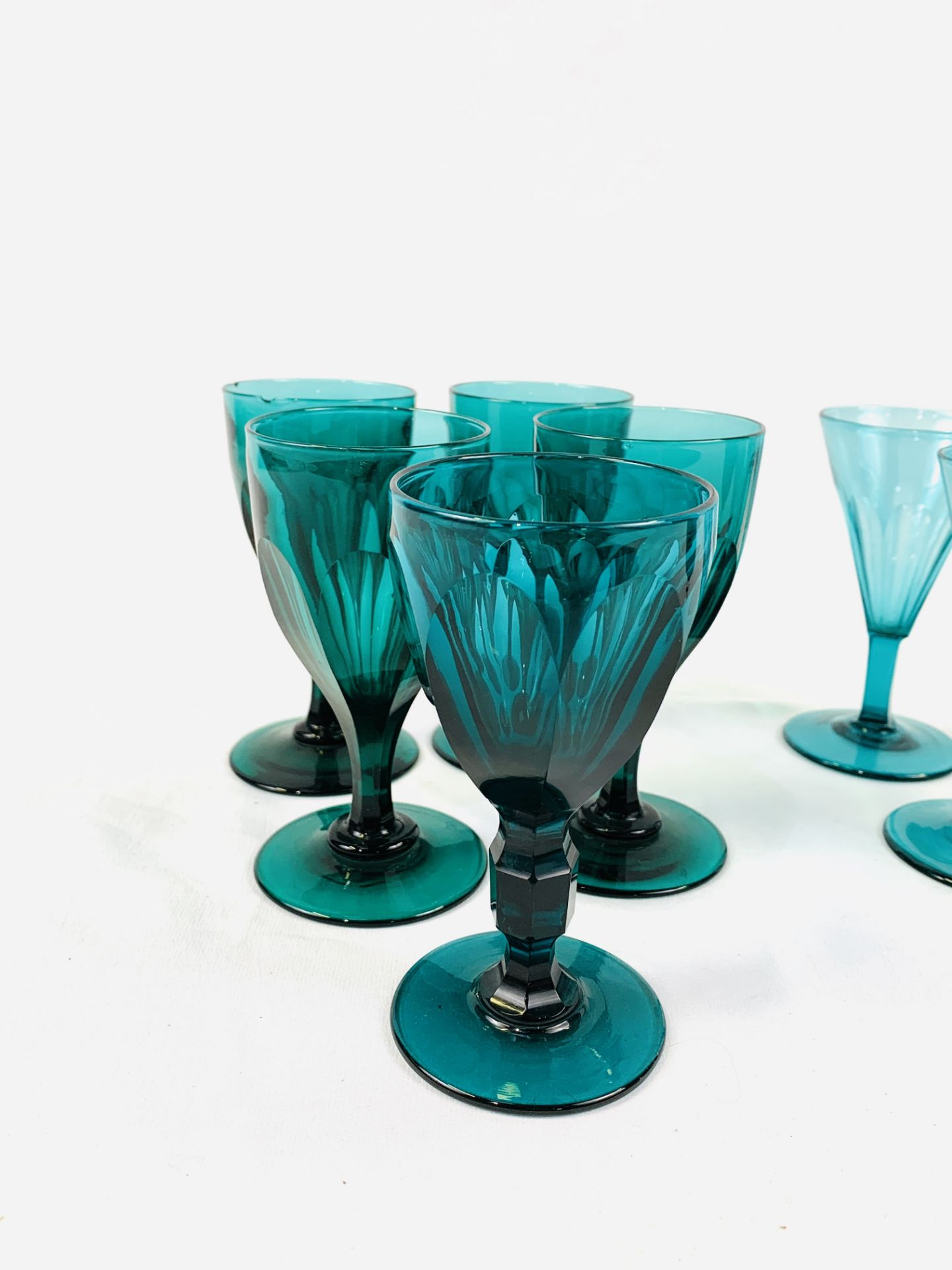 Nine Victorian green glass wine glasses. - Image 4 of 4