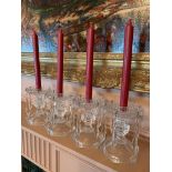 Group of four crystal glass candlesticks and a pair of glass candlesticks