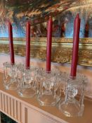 Group of four crystal glass candlesticks and a pair of glass candlesticks