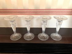 Set of four crystal glass candlesticks