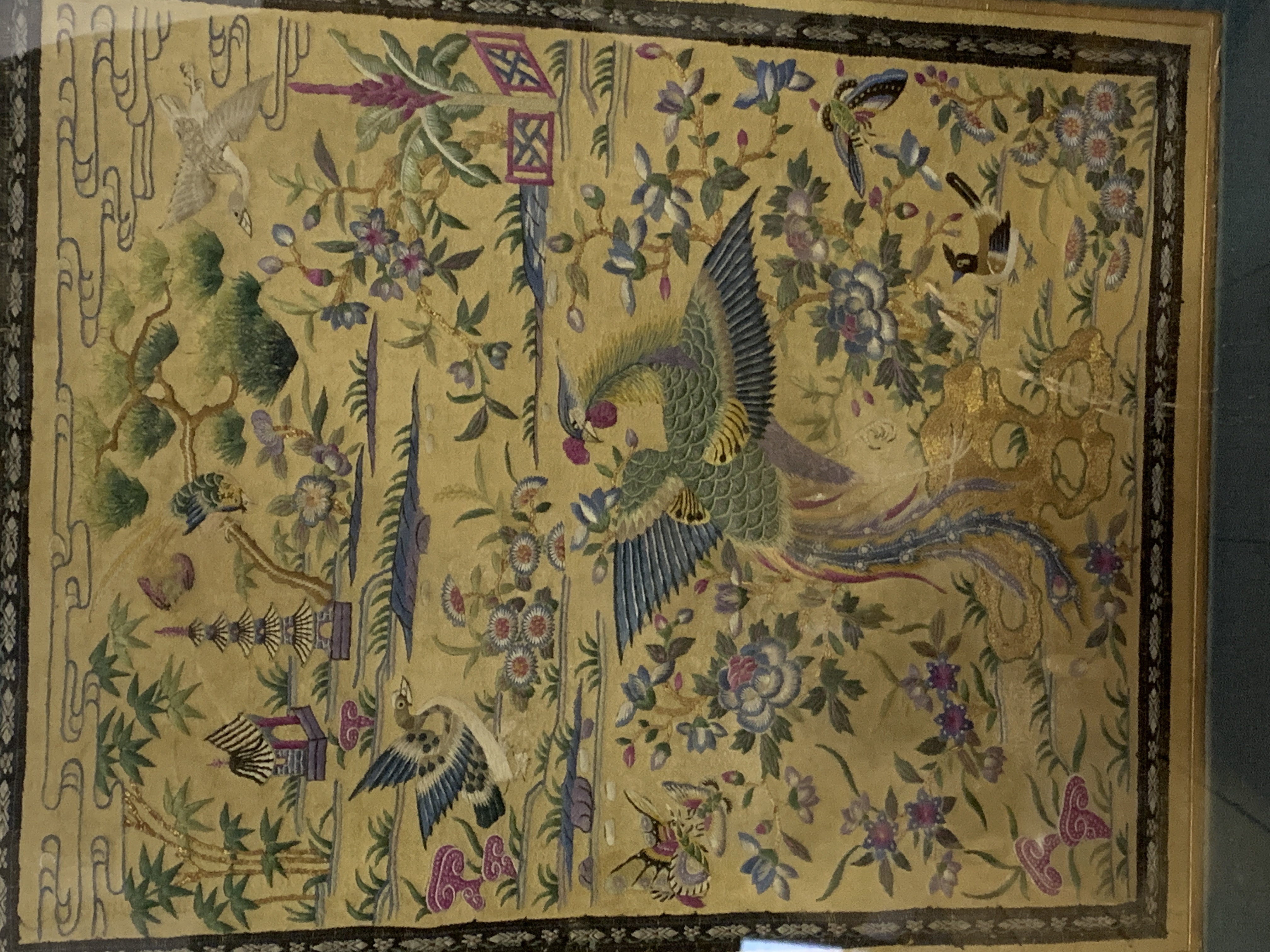 Framed and glazed Oriental silk embroidered panel of birds and flora