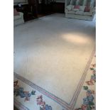 Very large cream oriental style carpet