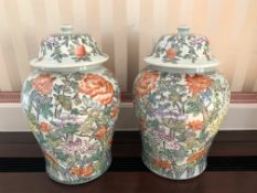 Pair of large decorative Oriental style lidded vases