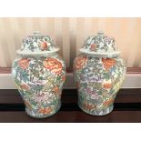 Pair of large decorative Oriental style lidded vases