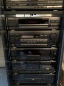 Kenwood stereo system in cabinet