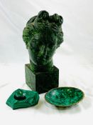 Carved wooden female head on plinth; a malachite dish with brass edge, and mottled green stone dish