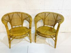 Pair of cane open arm chairs