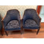 Two blue upholstered show wood tub chairs