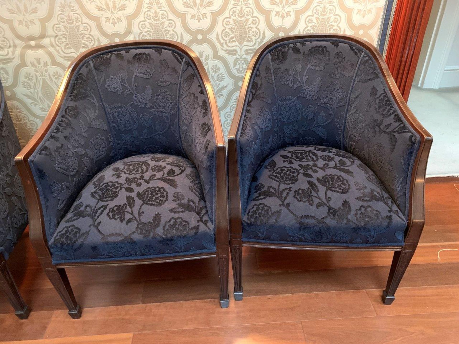 Two blue upholstered show wood tub chairs