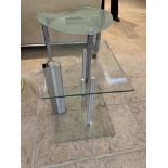 Shaped glass top table with chrome legs and glass top table with glass base