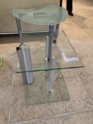 Shaped glass top table with chrome legs and glass top table with glass base