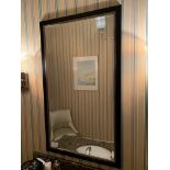 Ebonised and gilt framed wall mirror