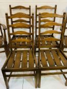 Four Ercol dining chairs and two Ercol carvers.