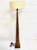 Leather covered obelisk shaped standard lamp