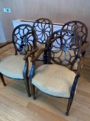 Set of four mahogany wheel back open arm chairs