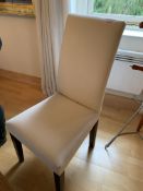 Cream upholstered high back chair