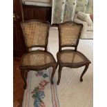 Pair of cane dining chairs