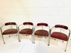 Four 1970s red leather and chrome chairs