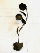 Copper and brass sculptured former lamp standard in the form of sunflowers; and another.