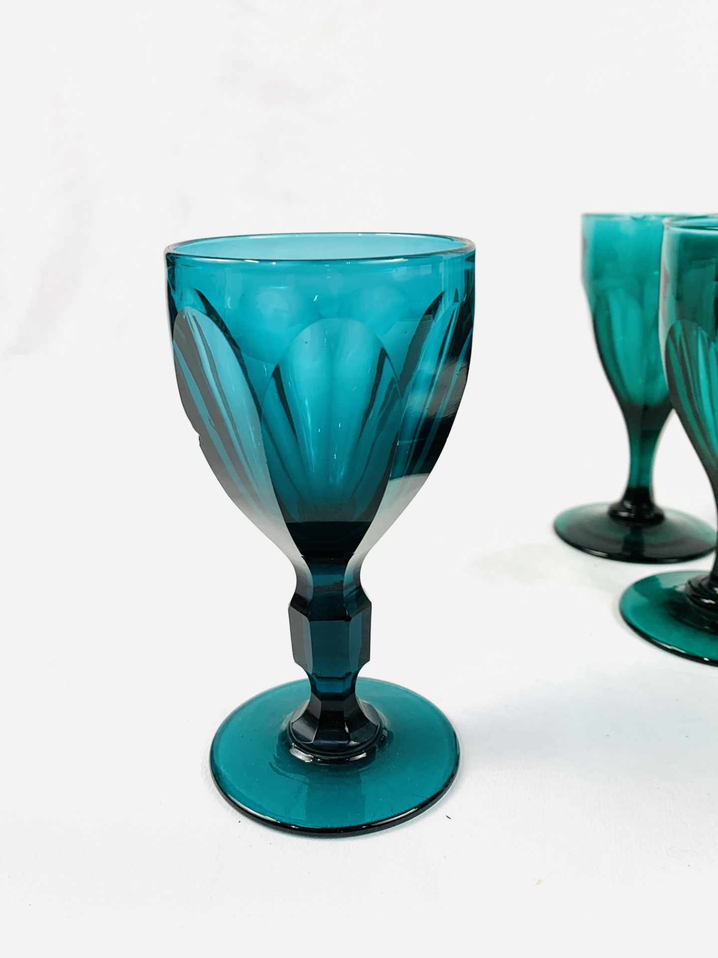 Nine Victorian green glass wine glasses. - Image 2 of 4