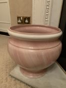 Large pink ceramic jardinière together with a studio pottery charger,