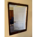 Two mahogany brass bound wall mirrors