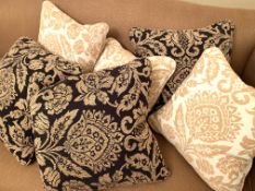 Six matching feather filled scatter cushions