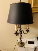 Candelabrum style lamp with adjustable metal shade