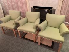 Three pistachio upholstered armchairs