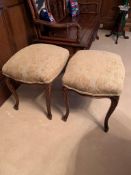 Pair of French style carved stools with upholstered seats