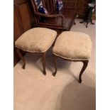 Pair of French style carved stools with upholstered seats