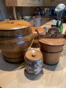 Four wooden lidded storage pots