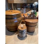 Four wooden lidded storage pots