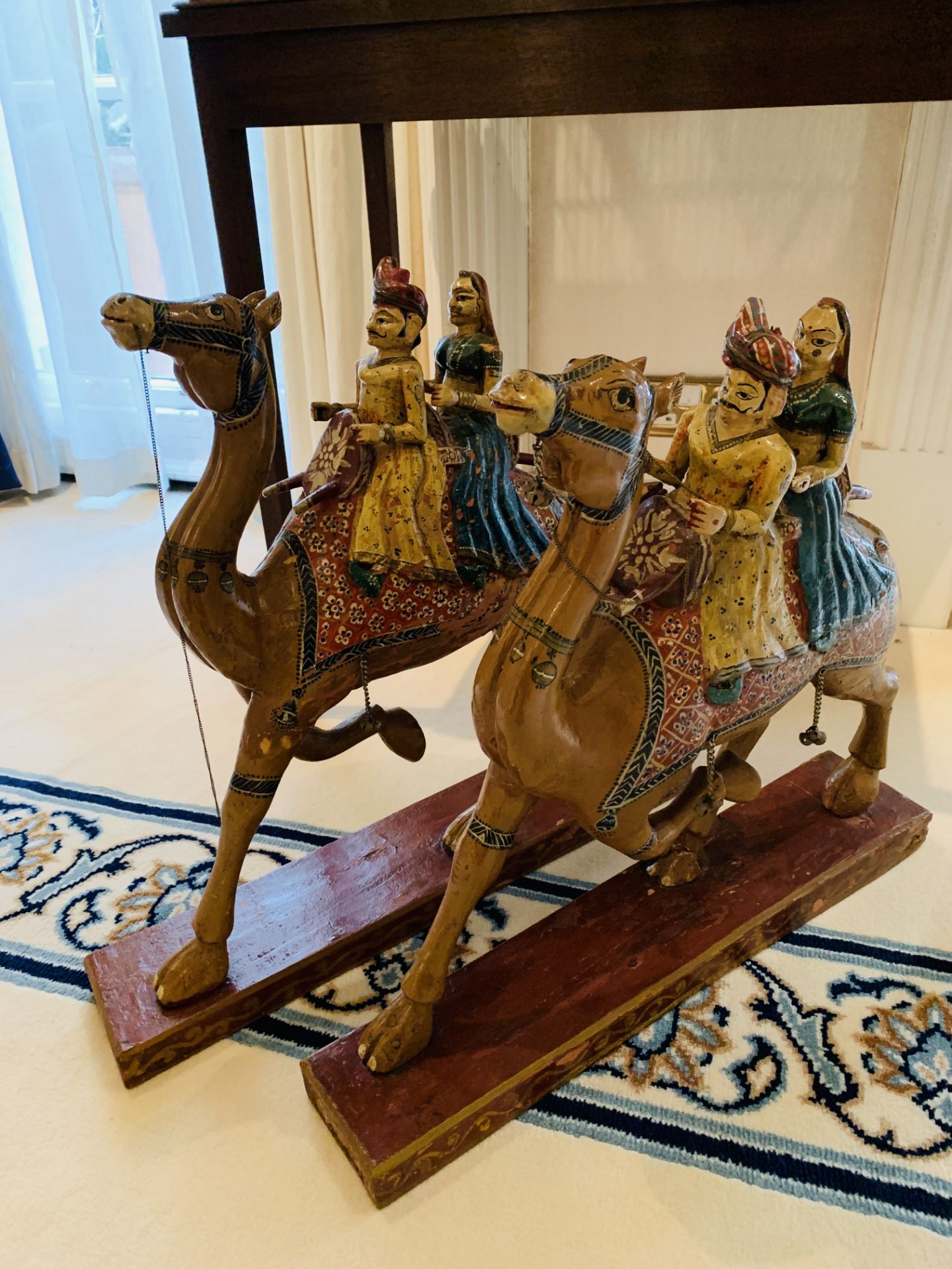 Pair of Indian carved wooden camels with riders - Image 2 of 4