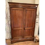 Modern mahogany linen press with four interior shelves